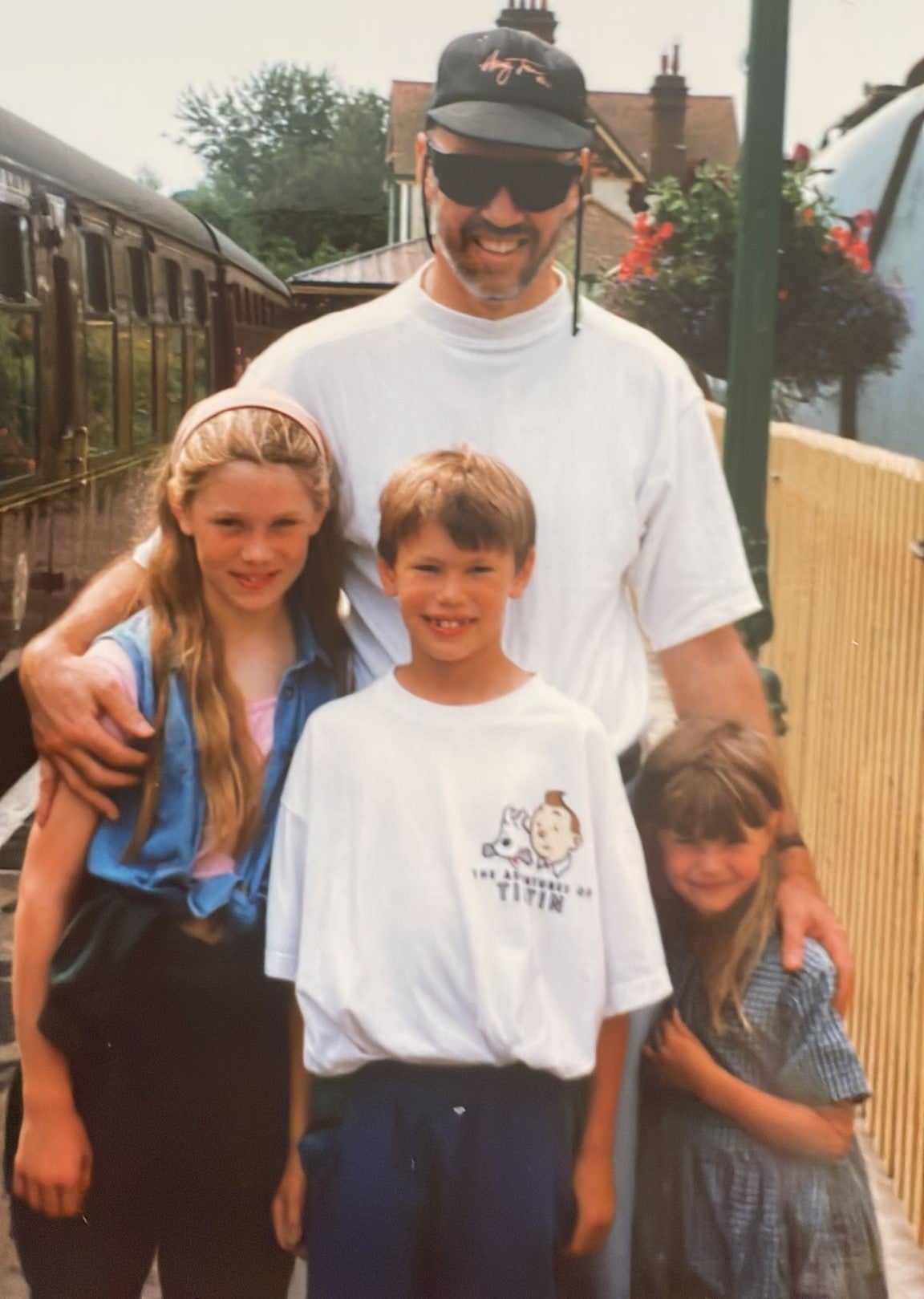 Phillip with his three children Sarah (left), Edward and Charlotte