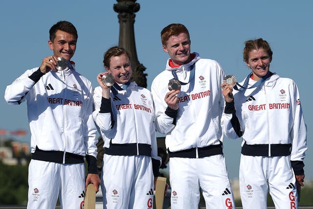 <p>Team GB with their bronze medal after a photo finish in the mixed triathlon relay </p>