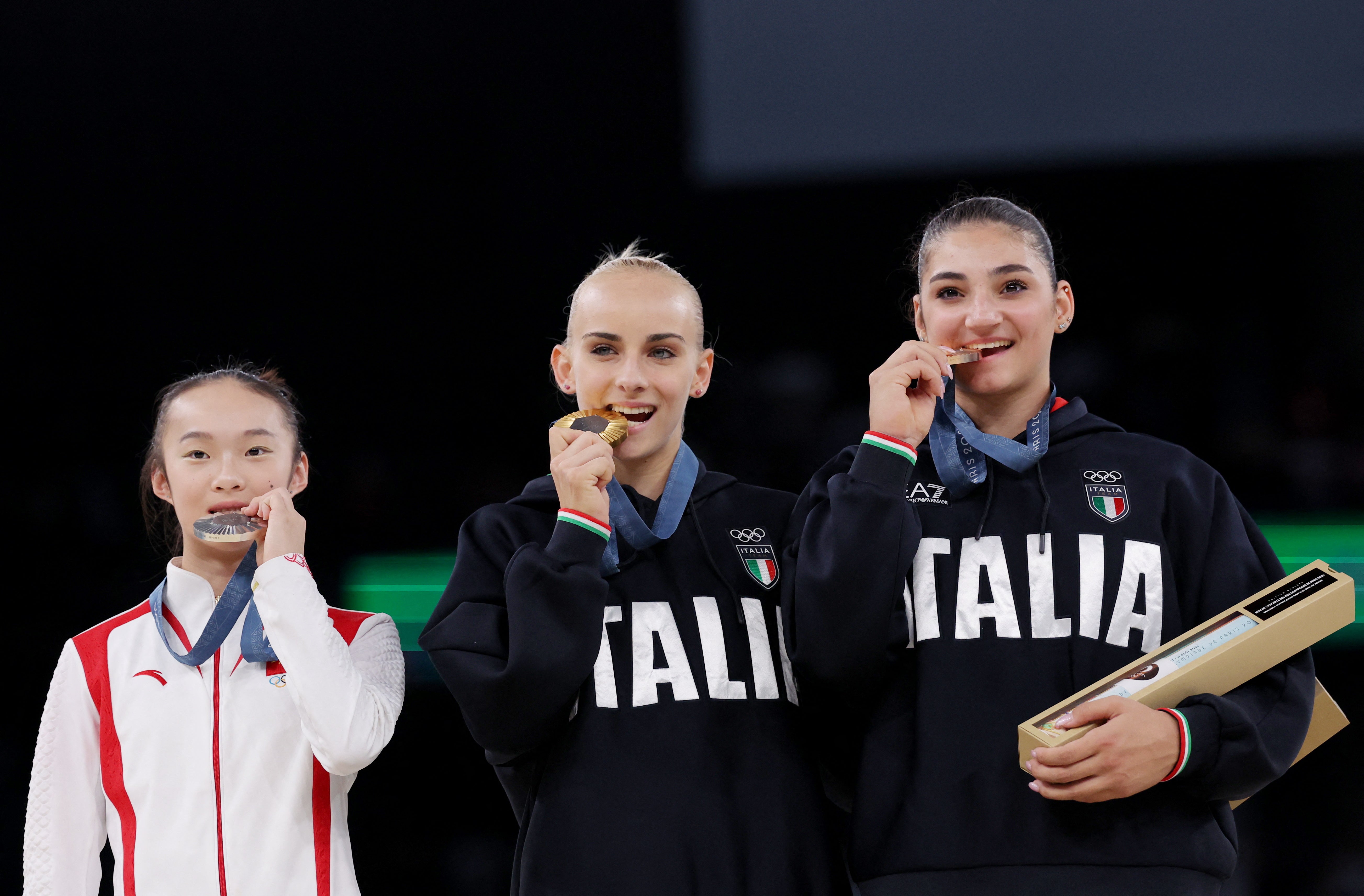 Gold medallist Alice D'Amato of Italy, silver medallist Yaqin Zhou of China, and bronze medallist Manila Esposito of Italy pose with their medals