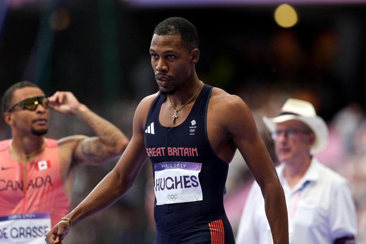 Zharnel Hughes withdraws from 200m heats with ‘hamstring tightness’