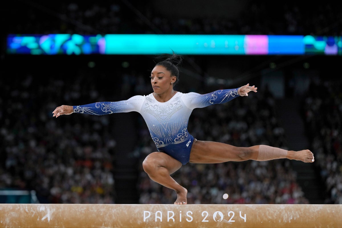 Simone Biles hits out at ‘weird’ atmosphere for Olympics beam final as several gymnasts fall 