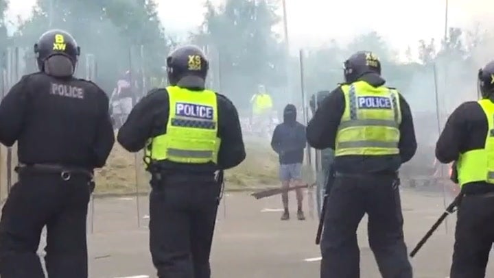 Police face rioters in Rotherham