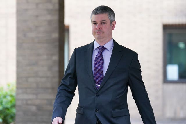 Kent Police constable Matthew Peall leaves Southwark Crown Court in London after an earlier appearance (James Manning/PA)