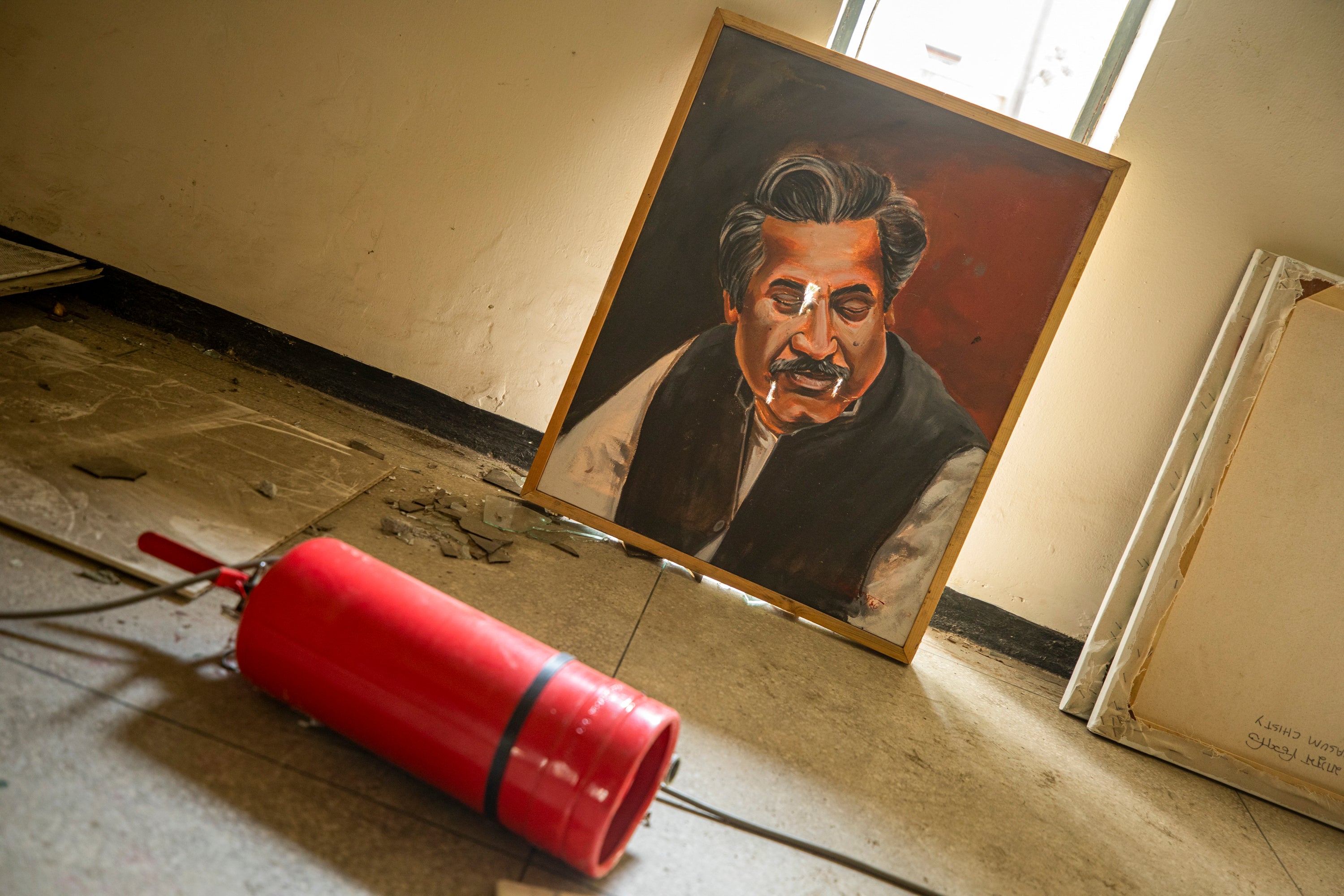 A vandalised portrait of Sheikh Mujibur Rahman, founding father of Bangladesh