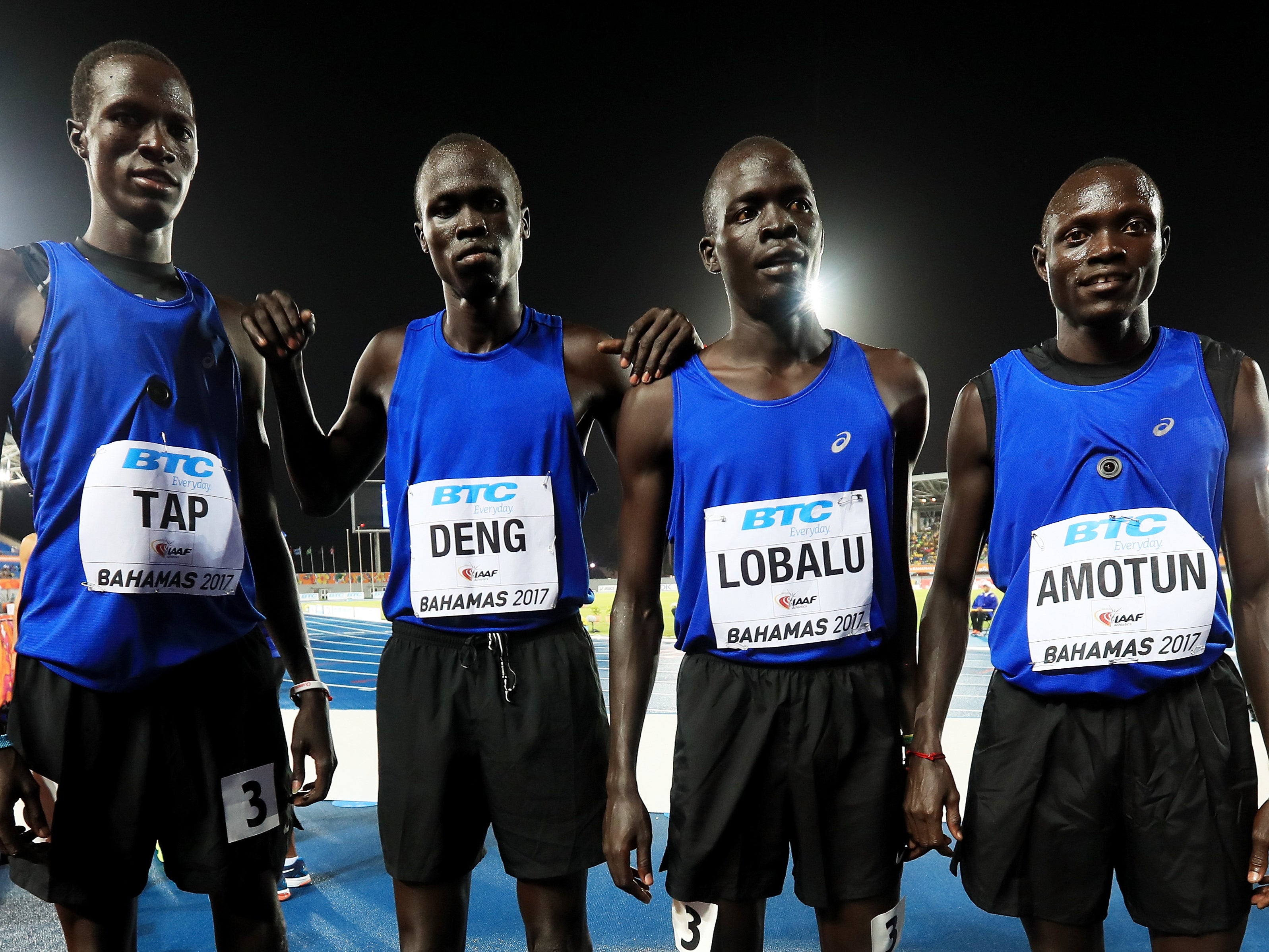 Lobalu (second right) with members of the Athlete Refugee Team in 2017