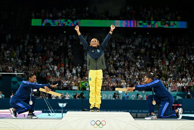 <p>Simone Biles (silver), Rebeca Andrade (gold) and Jordan Chiles (bronze) pose during the podium ceremony</p>