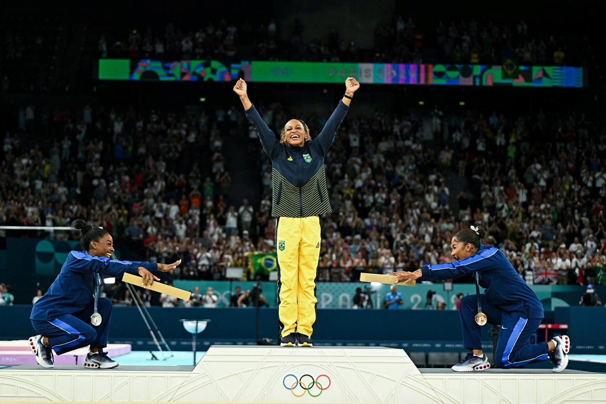 Simone Biles and Jordan Chiles affectionately bow to Brazilian athlete who beat them to gold medal