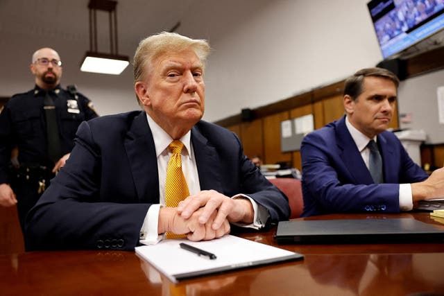 <p>Donald Trump sits in a criminal courtroom next to his attorney Todd Blanche on May 21. The Supreme Court has shot down an attempt from a Trump ally to throw out a gag order in the case. </p>