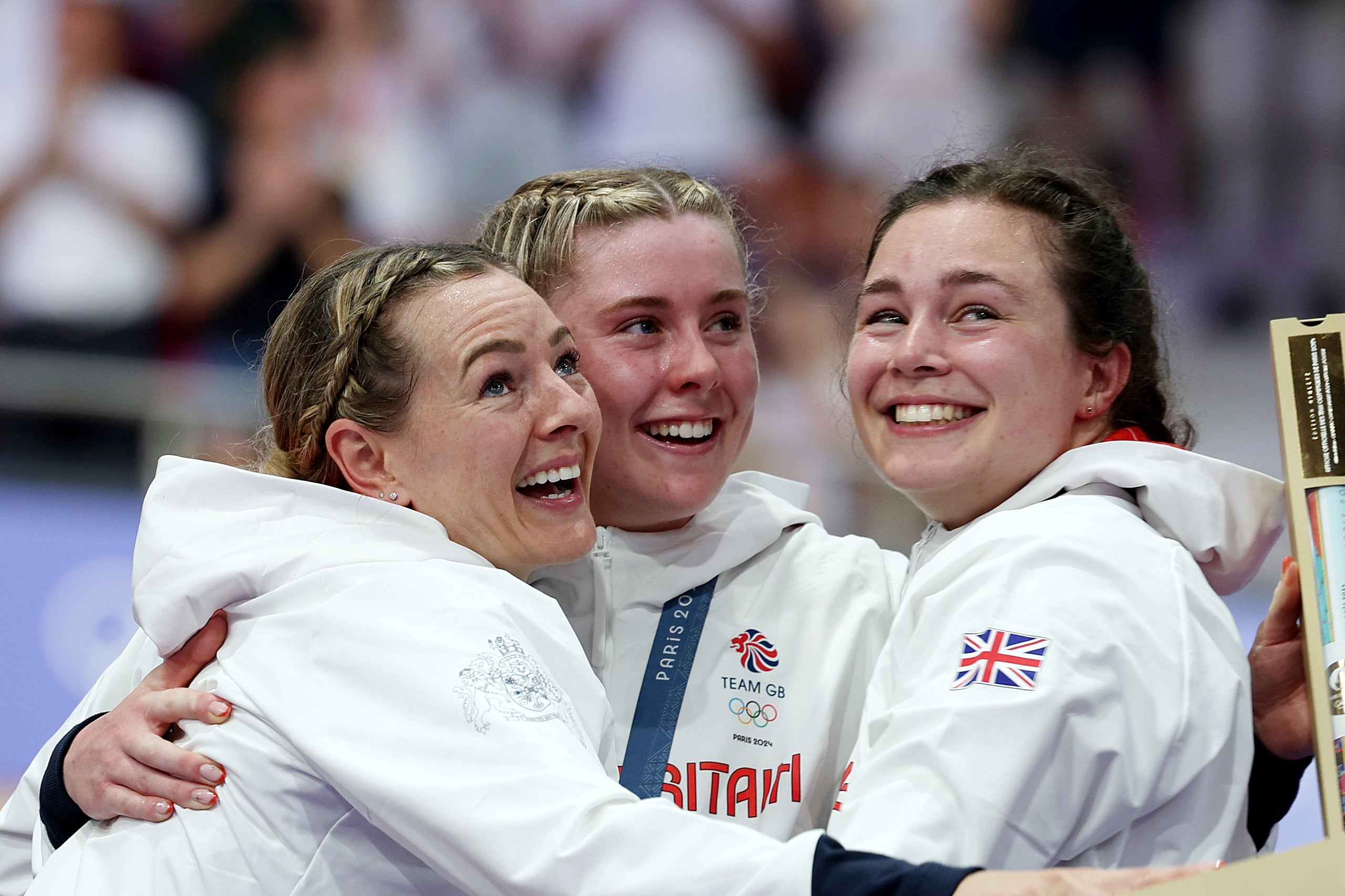 Gold medalists Katy Marchant, Sophie Capewell and Emma Finucane of Team Great Britain celebrate