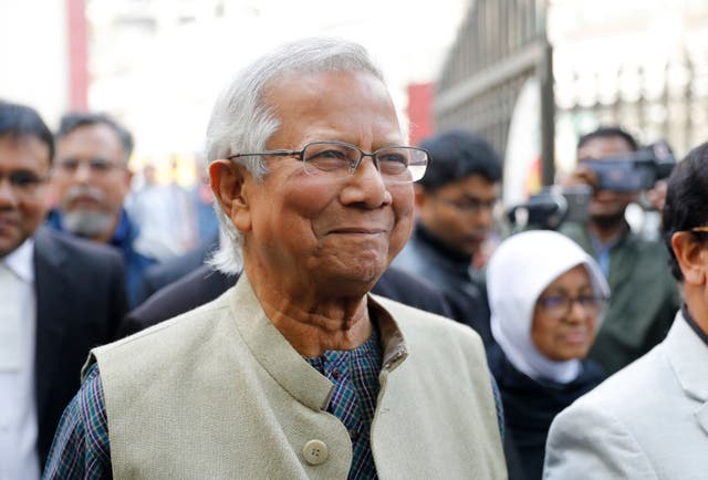 <p>File: Nobel Peace Prize laureate Muhammad Yunus smiles as he arrives to appear before a labor court in Dhaka, Bangladesh</p>