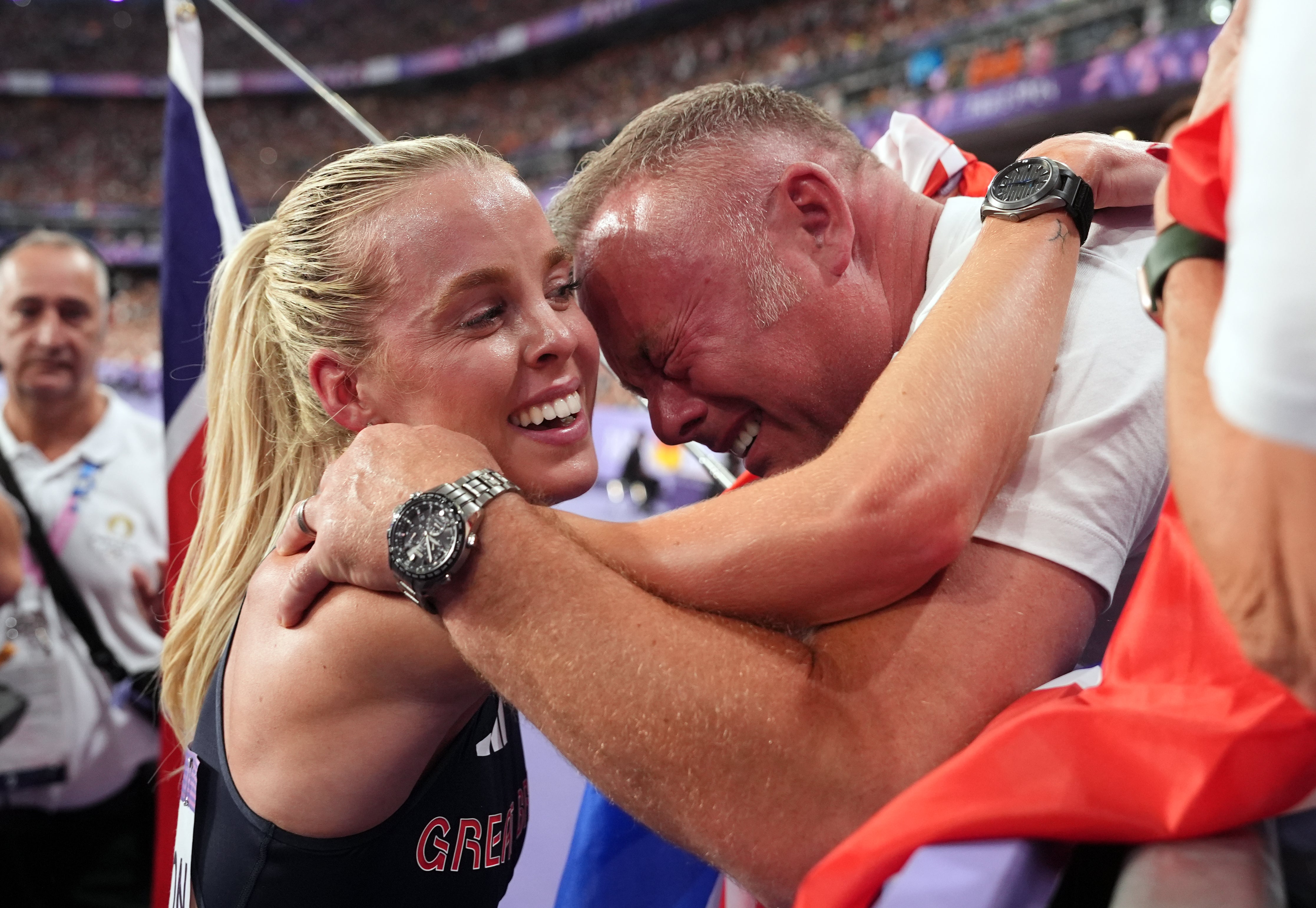 Keely Hodgkinson celebrates with her father