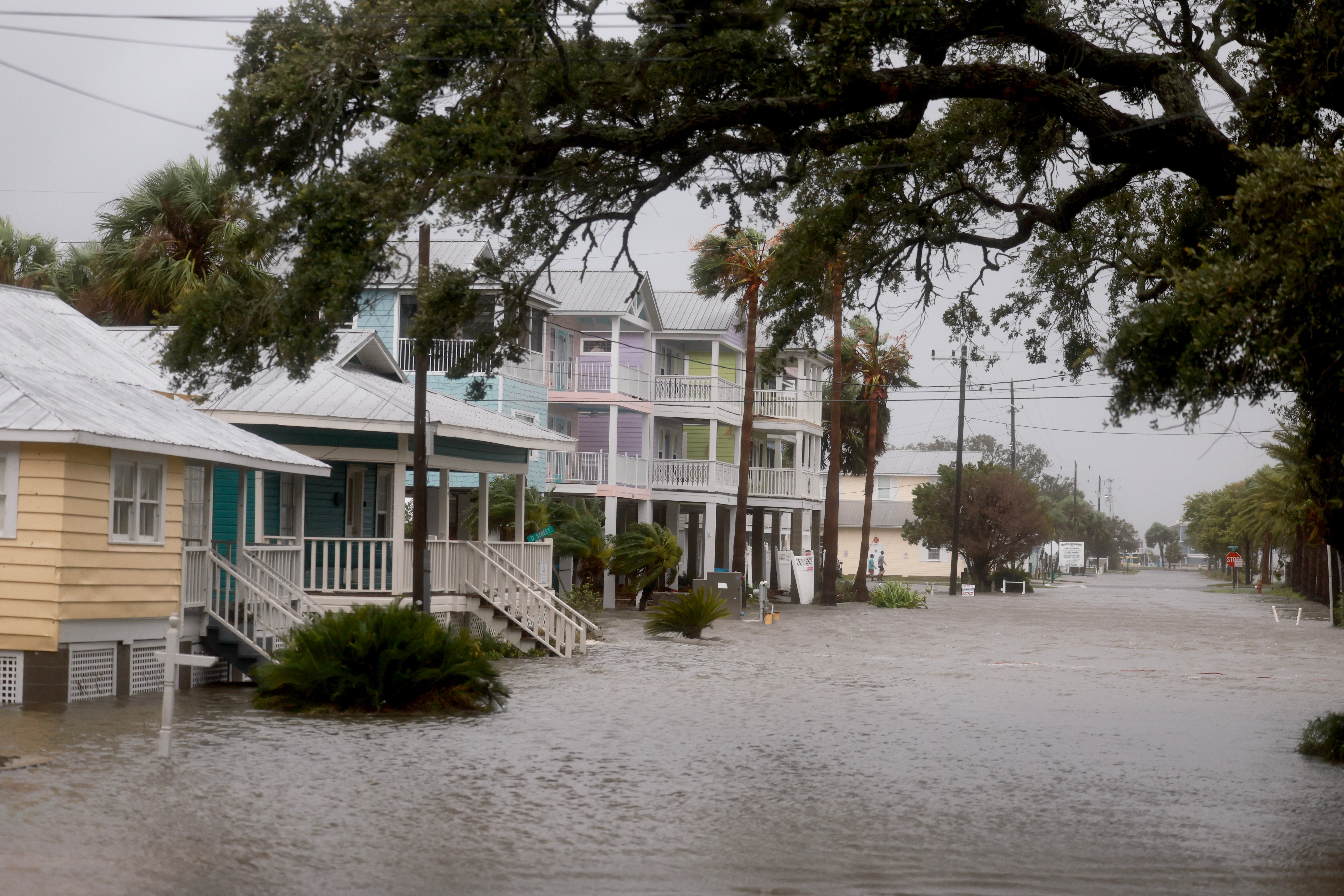 Rain from Tropical Storm Debby inundates a neighborhood in Cedar Key, Florida