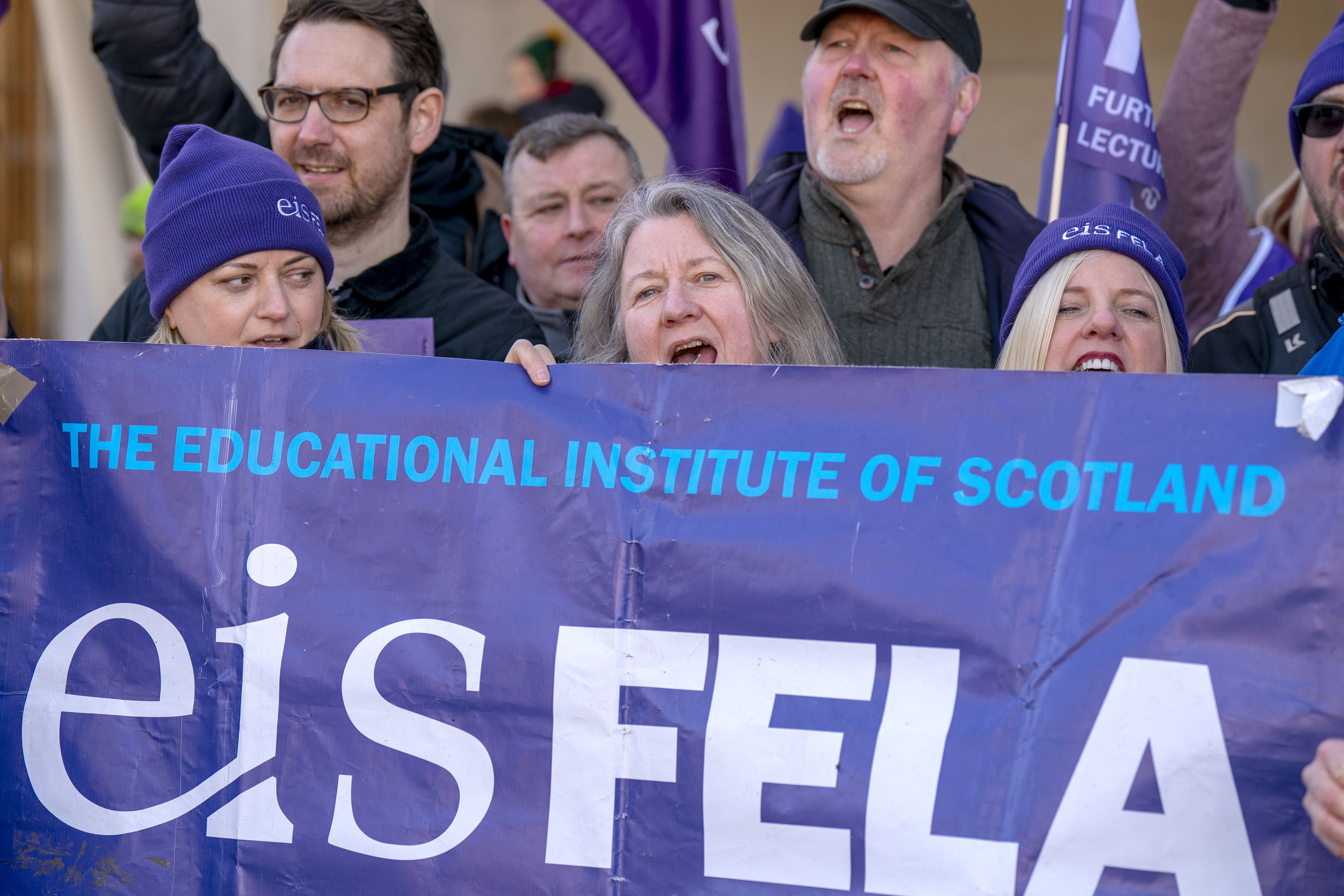 College lecturers from across Scotland gather at previous a rally outside the Scottish Parliament in Edinburgh. (Jane Barlow/PA)