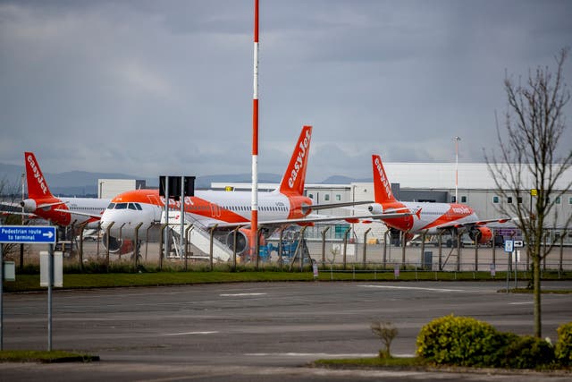 <p>EasyJet planes sit on the tarmac at Liverpool John Lennon Airport
</p>