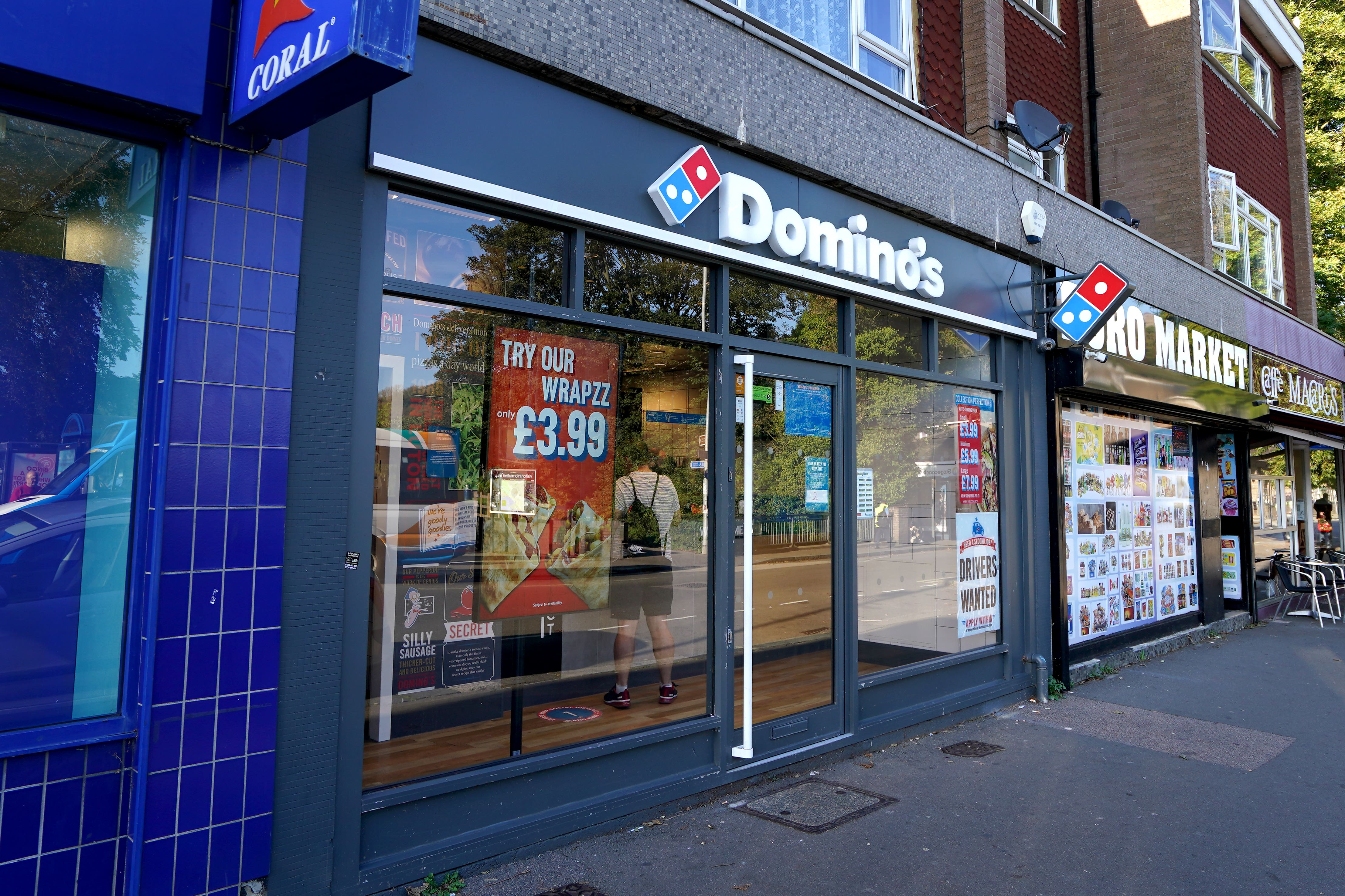 Domino’s has said it will pass lower costs on to customers through better discount deals (Gareth Fuller/PA)