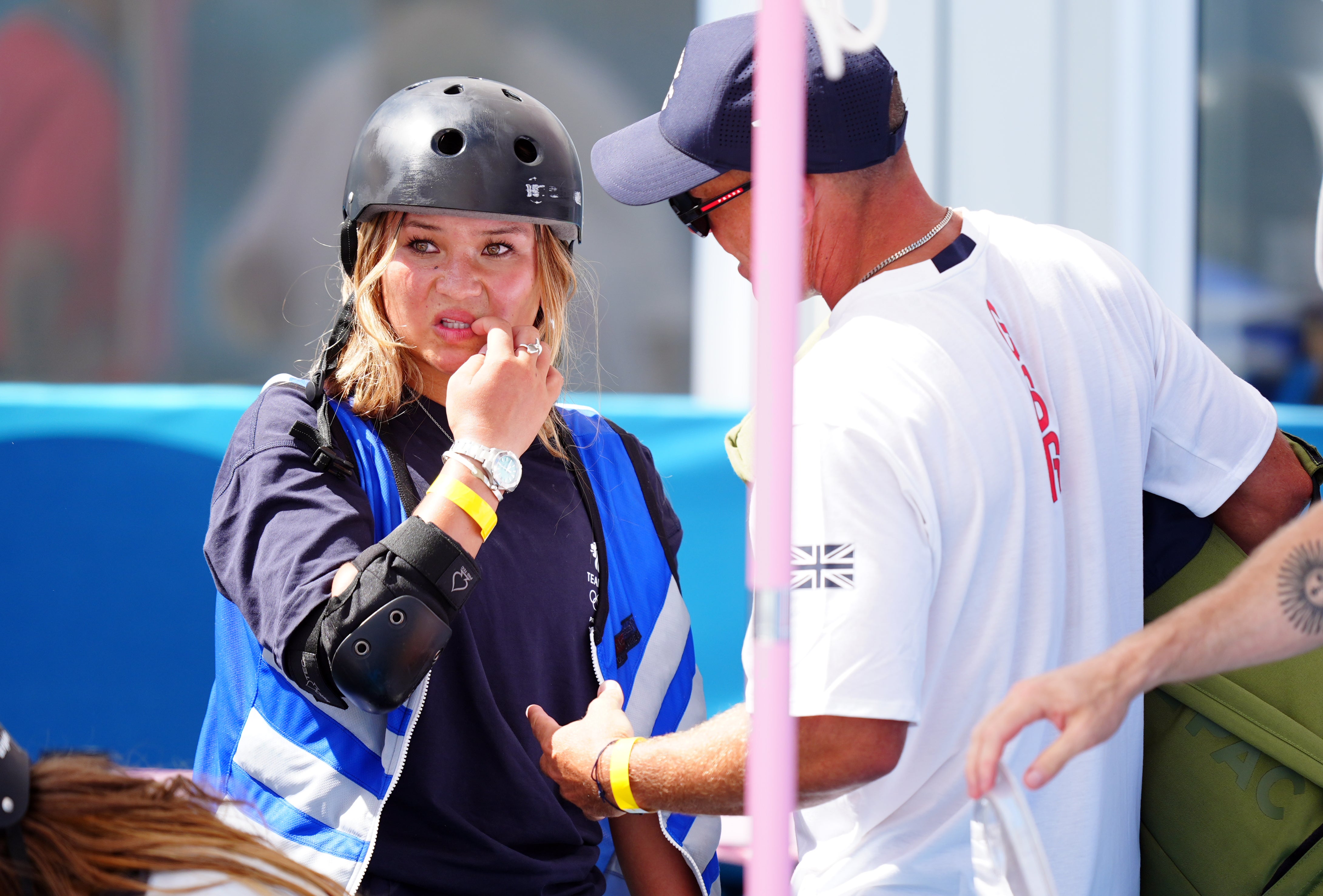 Brown anxiously conferred with her coach