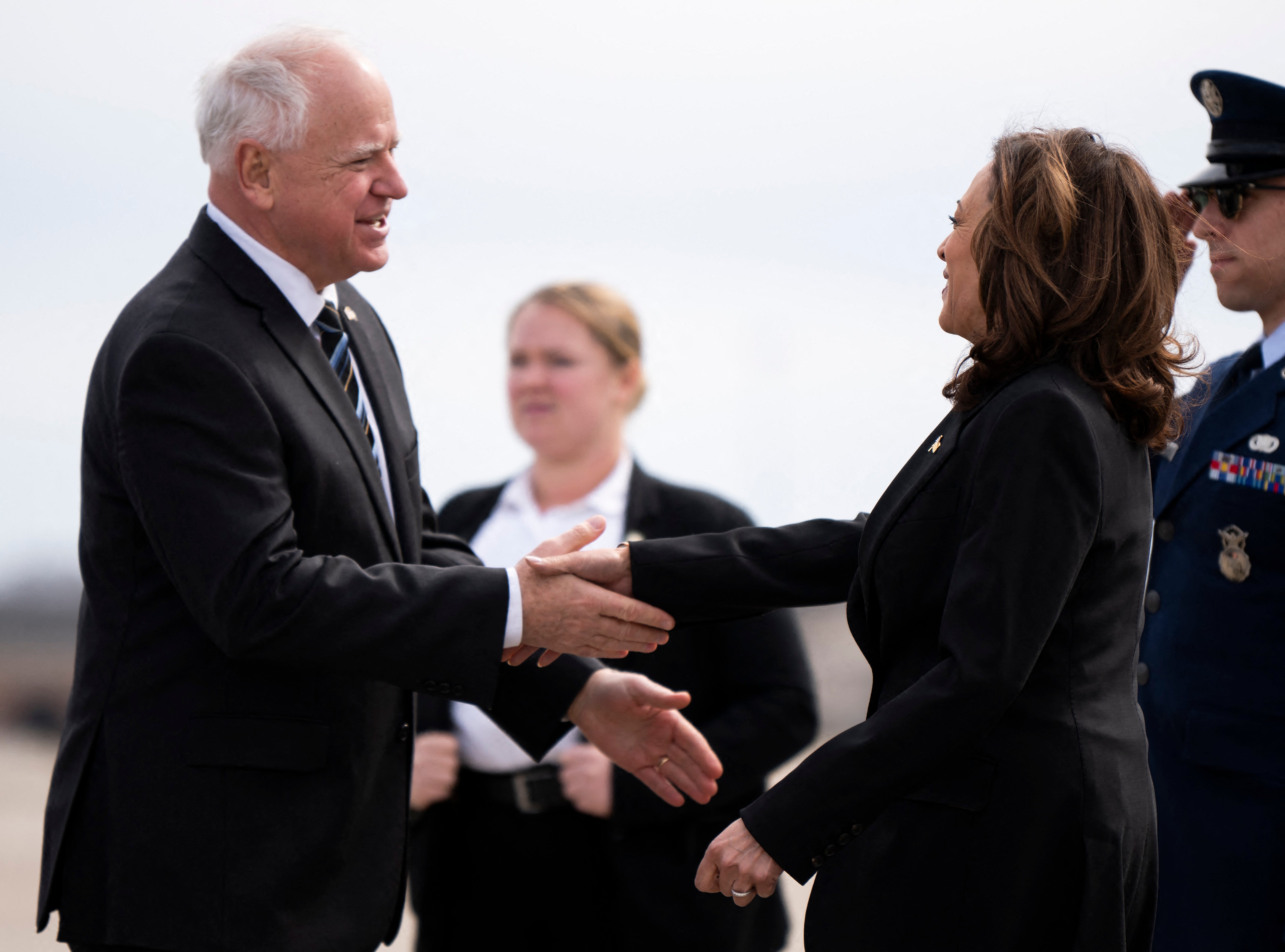 Minnesota Governor Tim Walz (left) greets Kamala Harris (right). The vice president announced Walz as her running mate on Tuesday morning