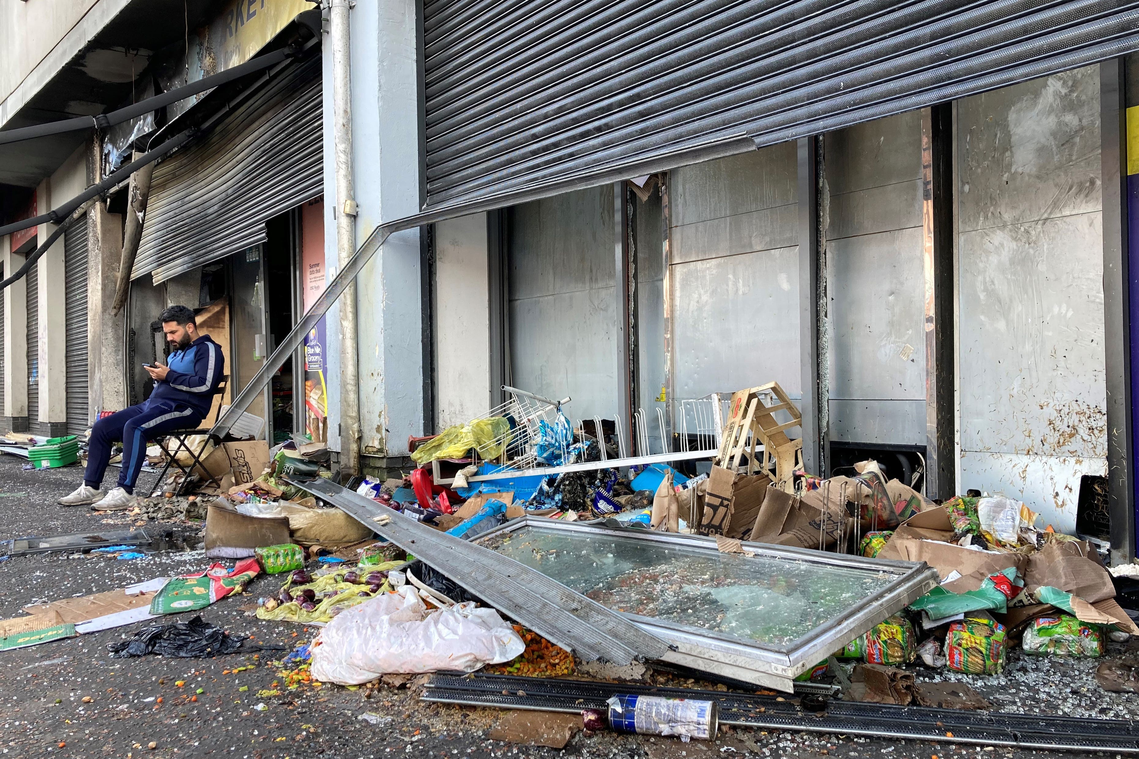 Abdelkader Mohamad Al Alloush, owner of the Sham Supermarket on Donegall Road in Belfast, after his shop was burned during disorder in the area following an anti-immigration protest on Saturday (Rebecca Black/PA)