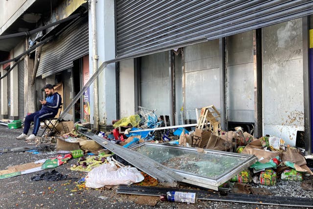 Abdelkader Mohamad Al Alloush, owner of the Sham Supermarket on Donegall Road in Belfast, after his shop was burned during disorder in the area following an anti-immigration protest on Saturday (Rebecca Black/PA)