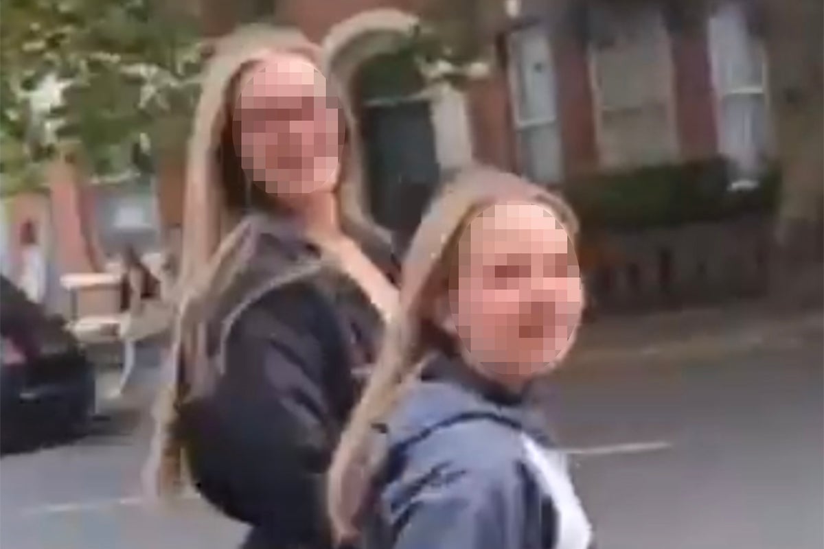 UK riots: Shock as young girl shouts racist abuse while holding hands with adult in Belfast street