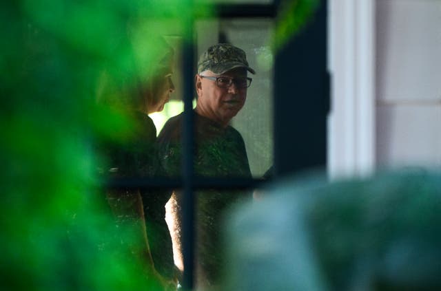 <p>Democratic vice presidential nominee Minnesota Governor Tim Walz prepares to leave his home on Tuesday  </p>