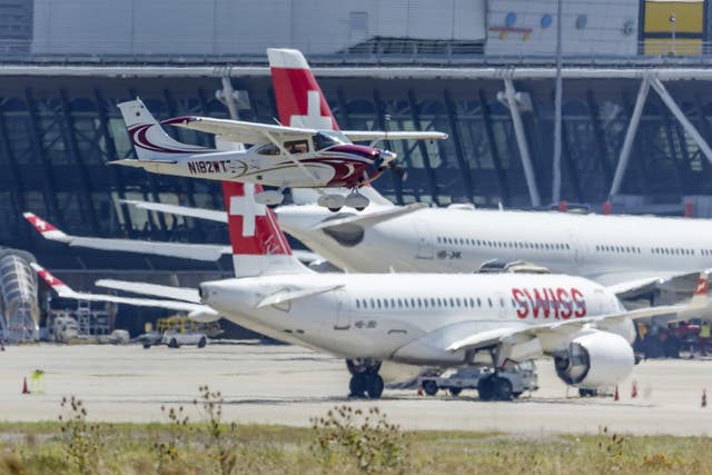 <p>American pilot Ethan Guo takes off from Geneva Airport</p>