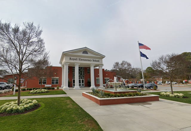 <p>Royall Elementary School in Florence, South Carolina. Several employees at the school were fired or placed on leave on August 1 after images of a staff event, meant to depict a ‘cantina’, showed staffers in US Border Patrol shirts standing in front of a fake border wall</p>