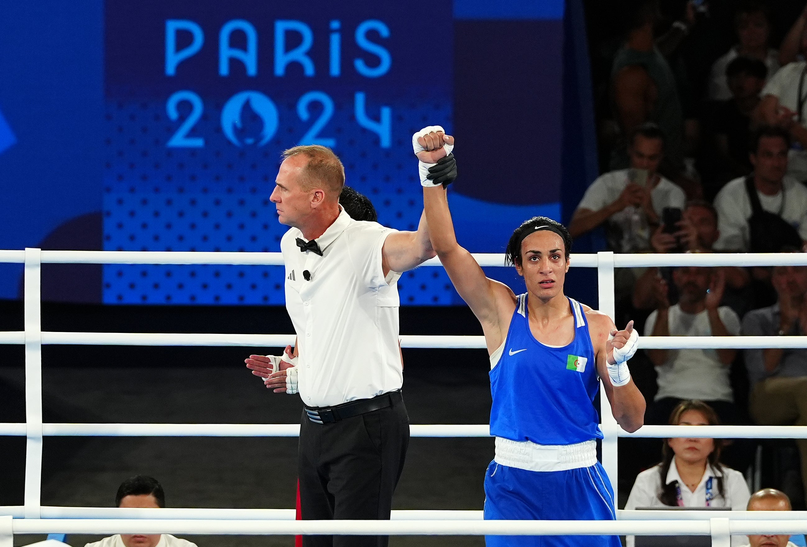 Algeria’s Imane Khelif (right) celebrates victory over Thailand’s Janjaem Suwannapheng in the women’s 66kg semi-final (Peter Byrne/PA).