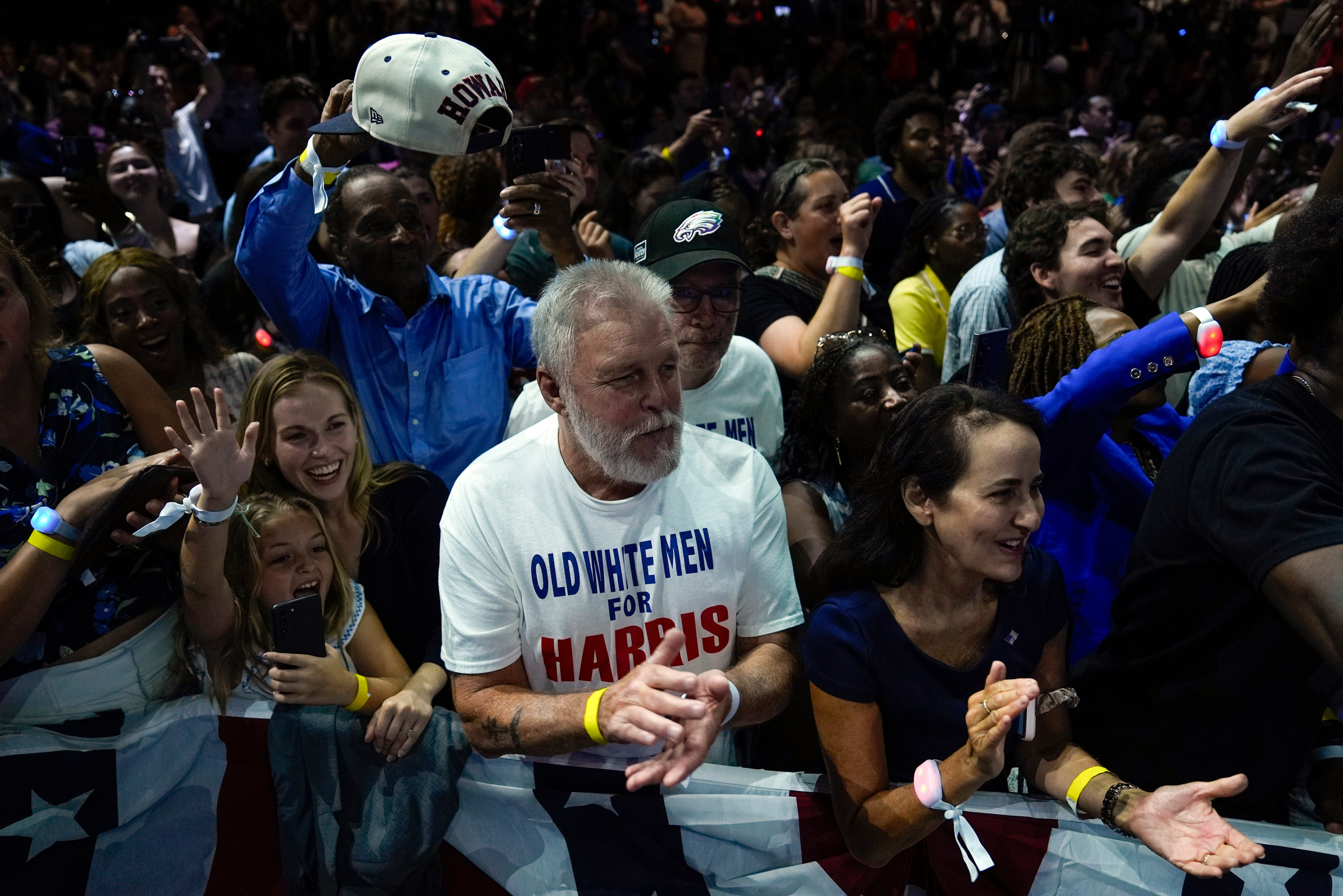 Walz quipped ‘I see those old white guys’ when he spotted a member of ‘Old White Men for Harris’ on the front row at the Philadelphia rally on August 6