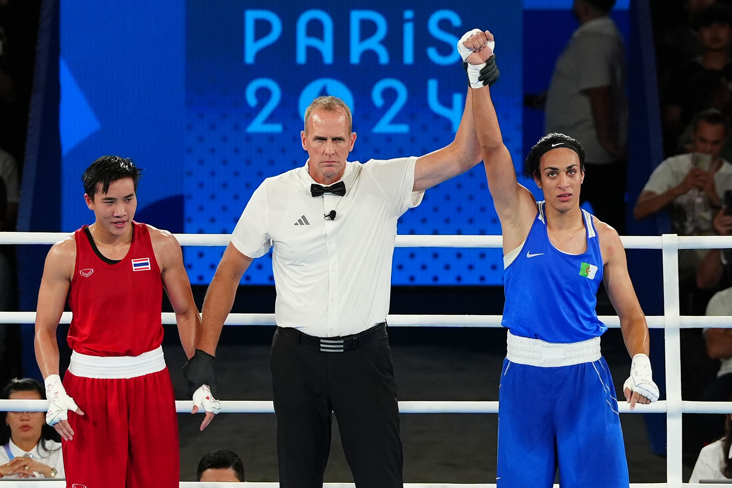 Imane Khelif, right, has dismissed the gender row after reaching the women’s welterweight final (Peter Byrne/PA)