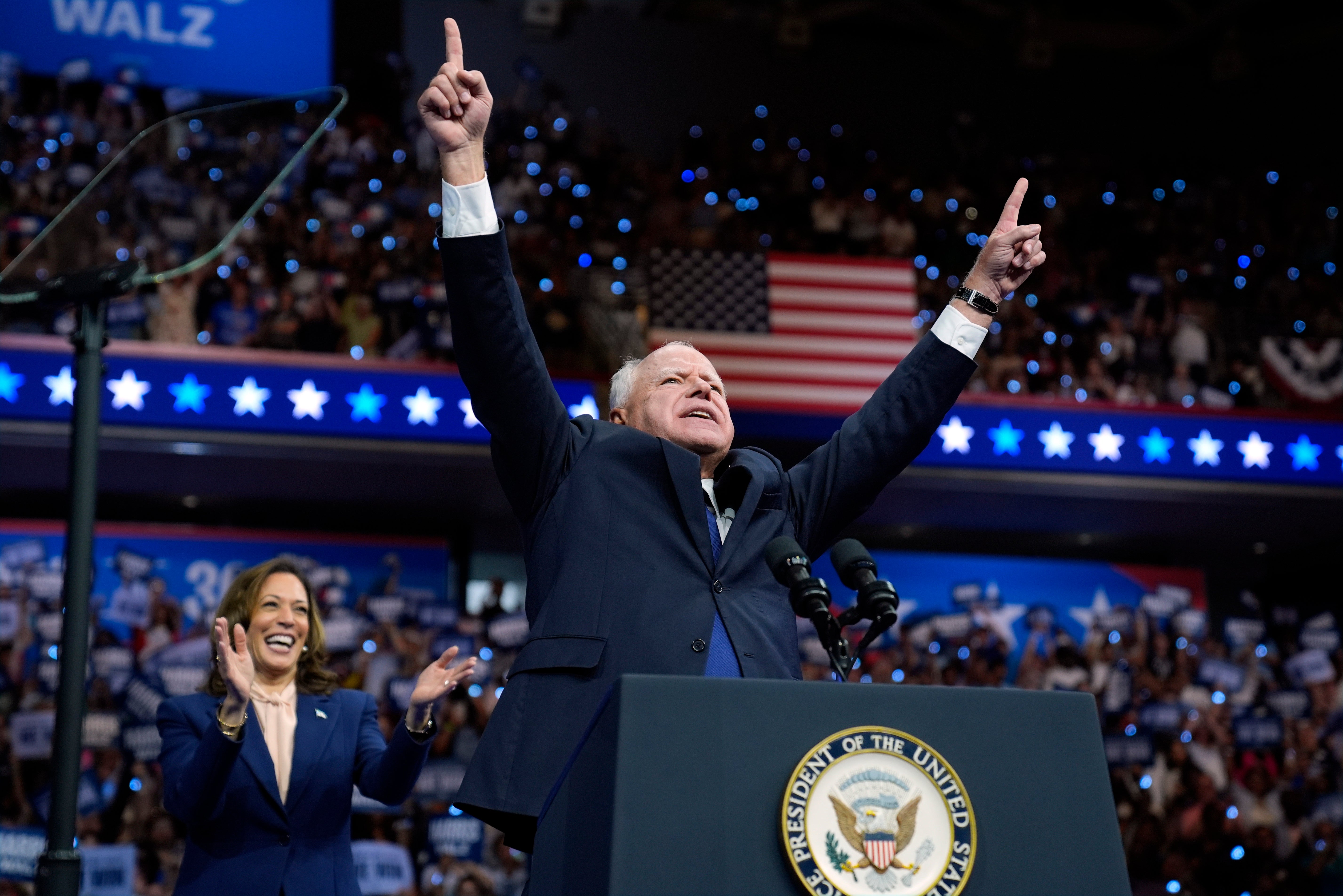 Democratic vice presidential nominee Minnesota Gov. Tim Walz and Democratic presidential nominee Vice President Kamala Harris speak at a campaign rally in Philadelphia, Tuesday, Aug. 6, 2024.