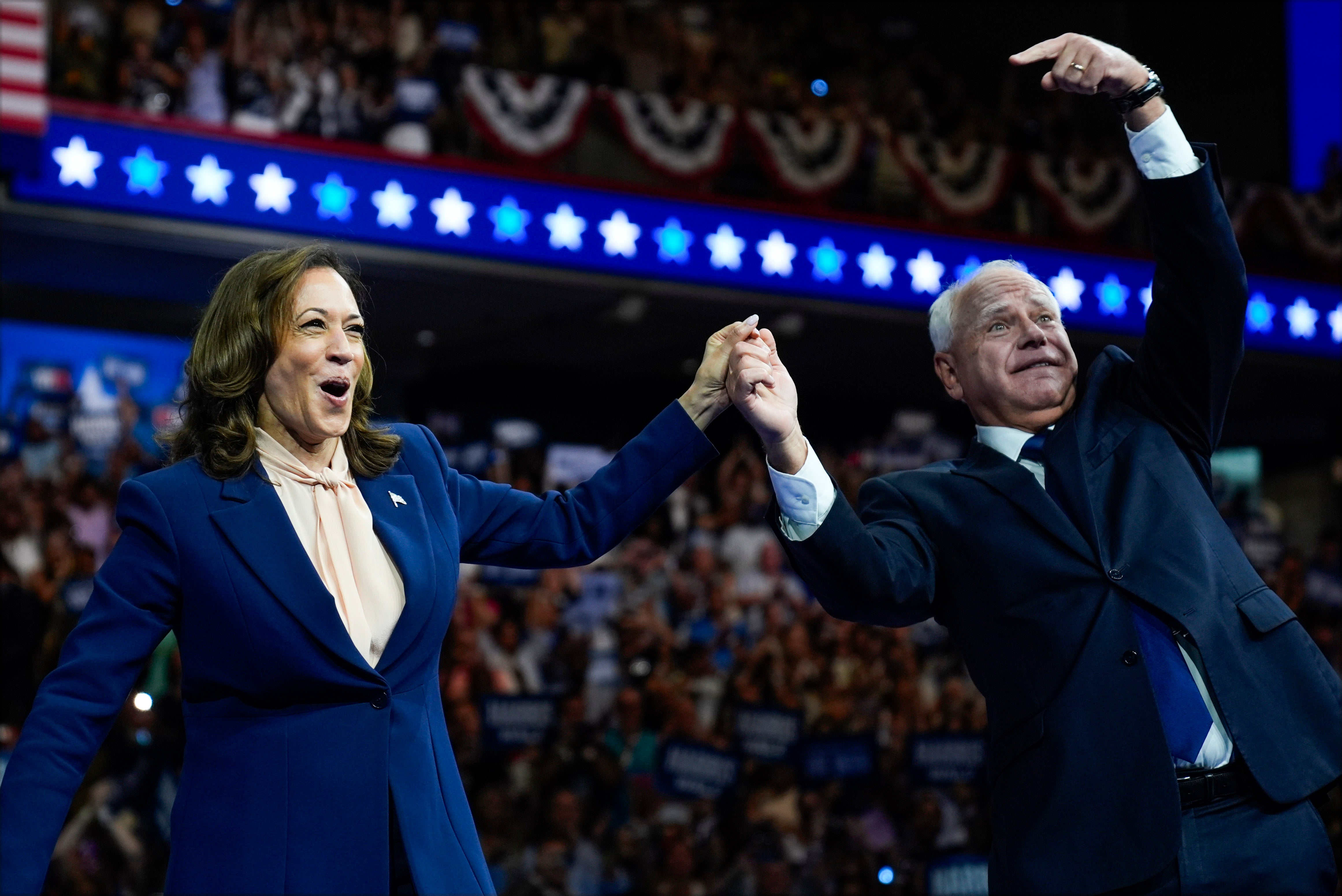 Harris and Walz took to stage at their first rally together on Tuesday night