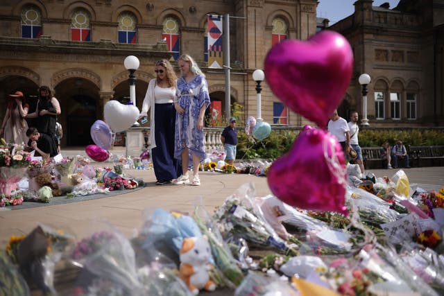 Flowers and tributes outside the Atkinson Art Centre Southport (James Speakman/PA)