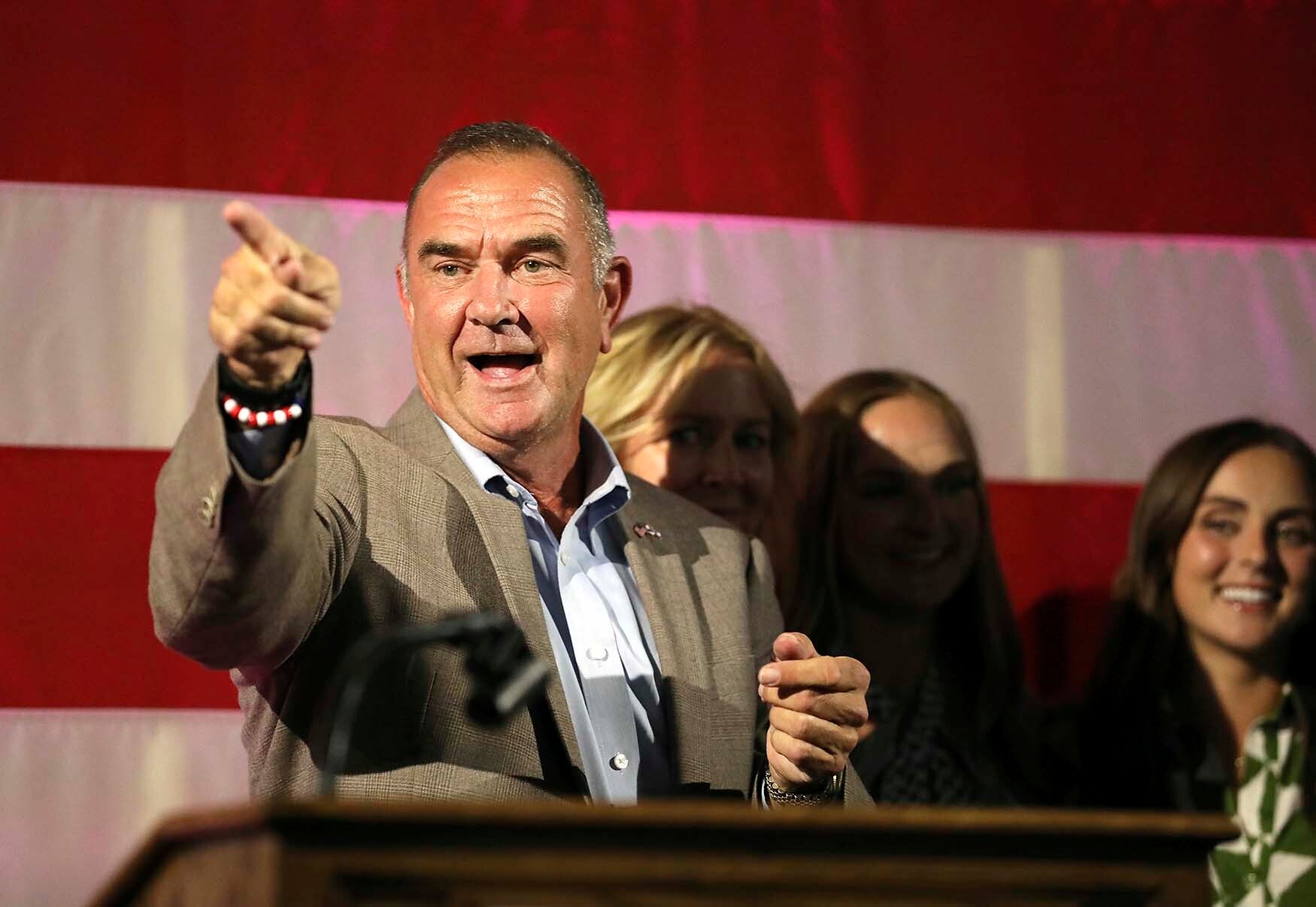 Mike Kehoe points to the crowd after announcing his win of Missouri Governor on Tuesday, 6 August 2024