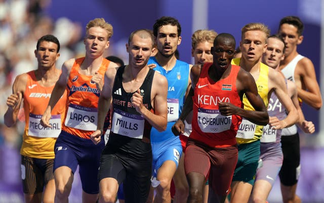 <p>Great Britain’s George Mills (third from left) during the men’s 1500 metres heat at the Stade de France (Martin Rickett/PA).</p>