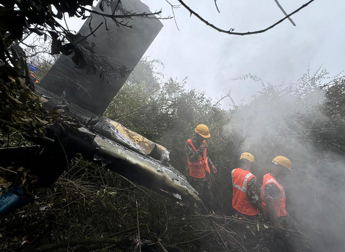 5 people killed in a helicopter crash in the mountains northwest of Nepal's capital