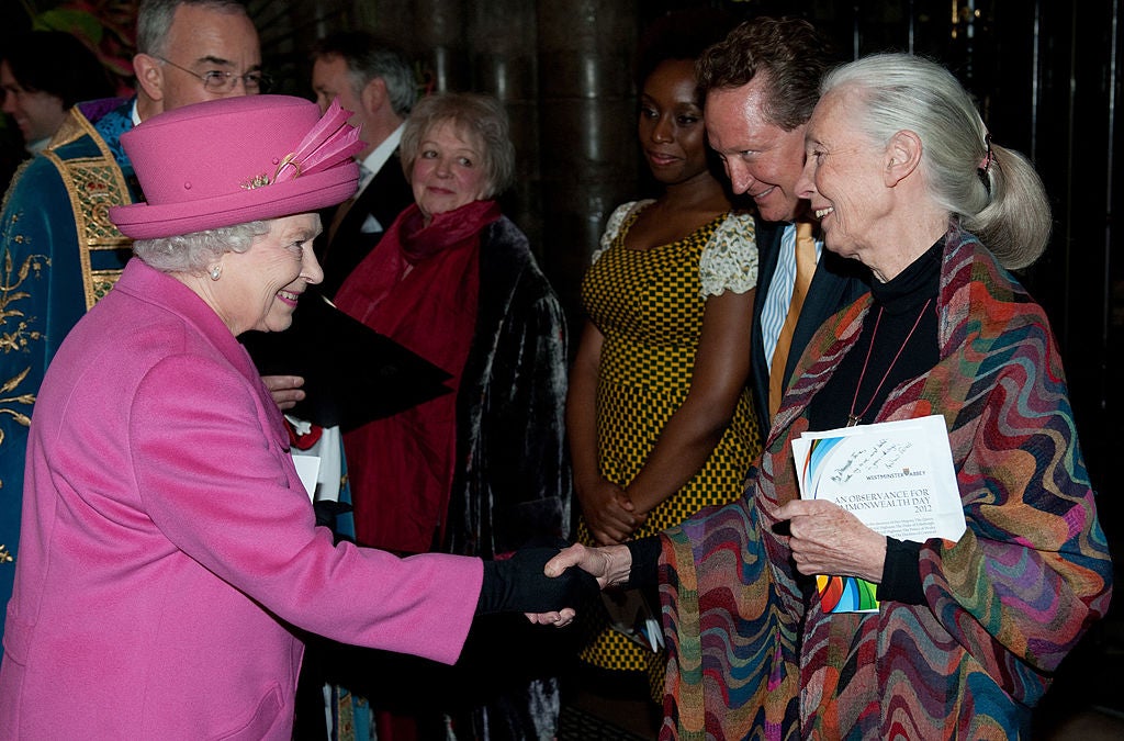 The late Queen shakes hands with environmentalist Dr Jane Goodall DBE after the annual Commonwealth Day service in London on March 12, 2012.