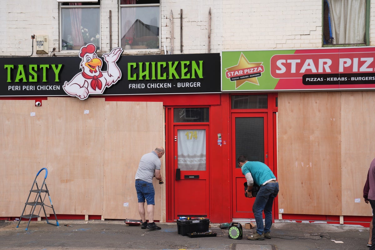 Shops boarded up as Northampton takes precautions against far-right riots