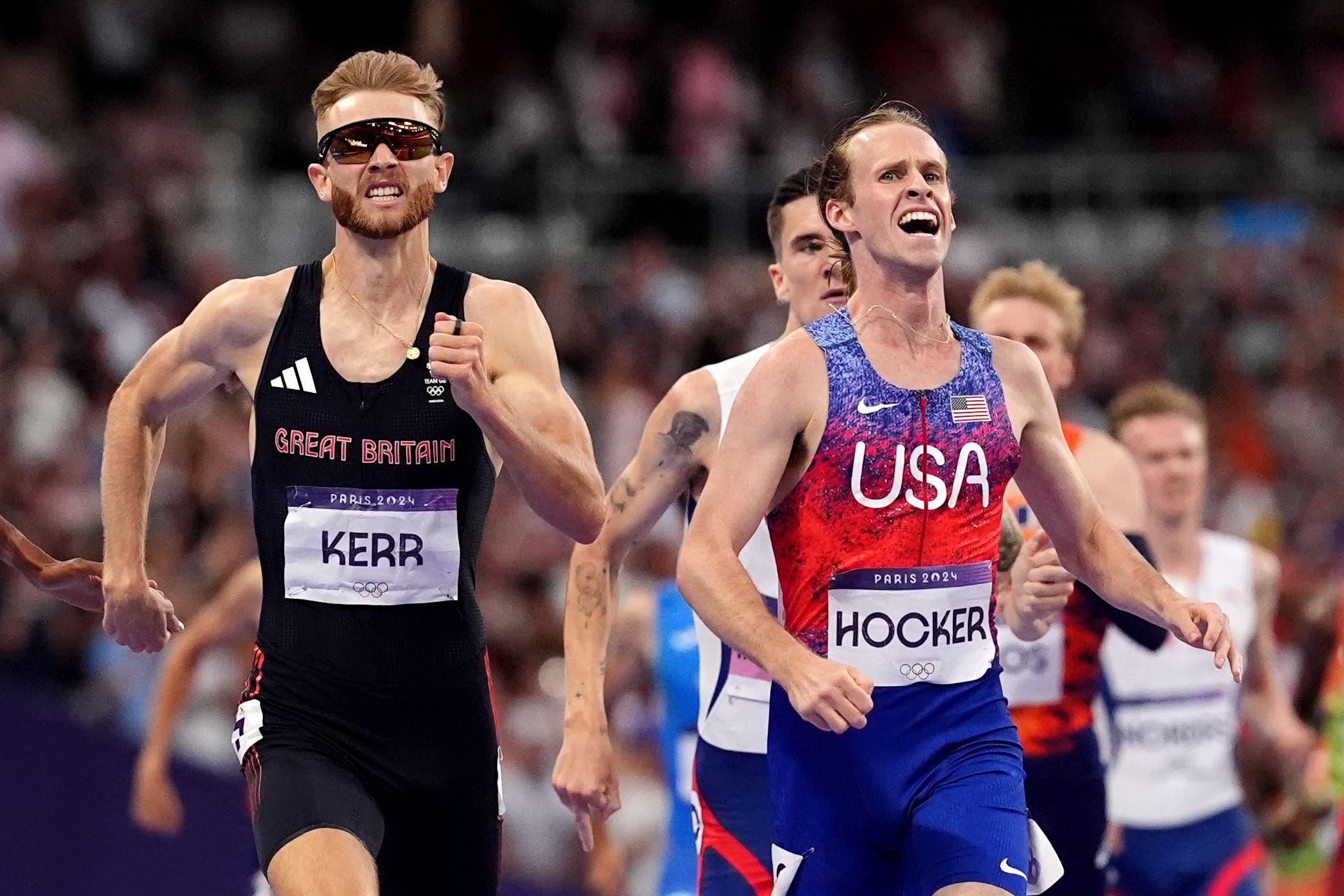 USA’s Cole Hocker (right) celebrates winning the men’s 1500 metres ahead of Great Britain’s Josh Kerr (left) at Stade de France (Martin Rickett/PA).