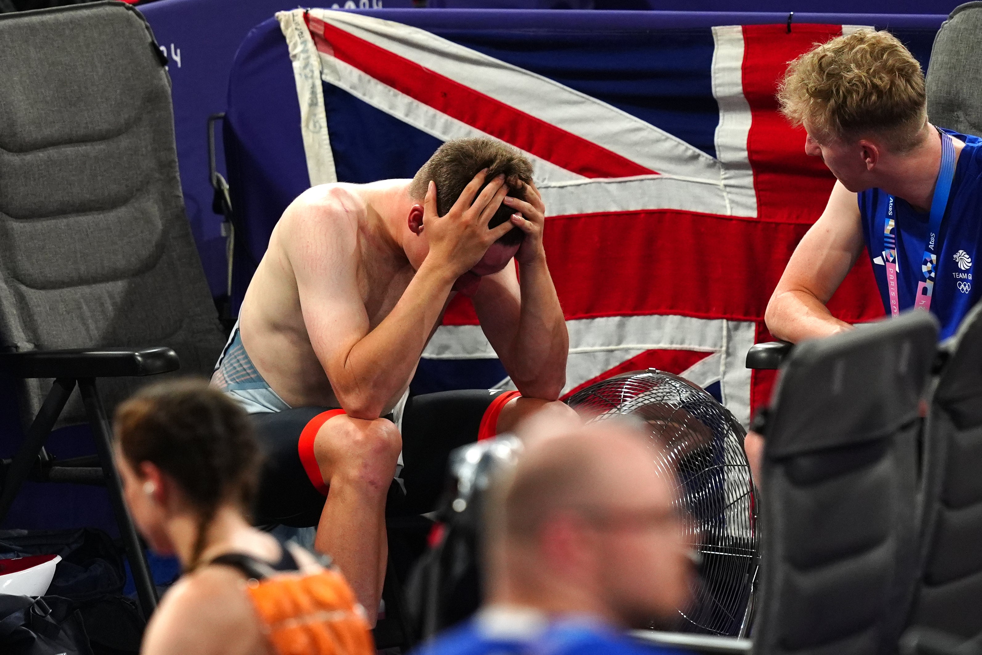 Ethan Hayter was consoled by his team-mates after the incident (David Davies/PA)