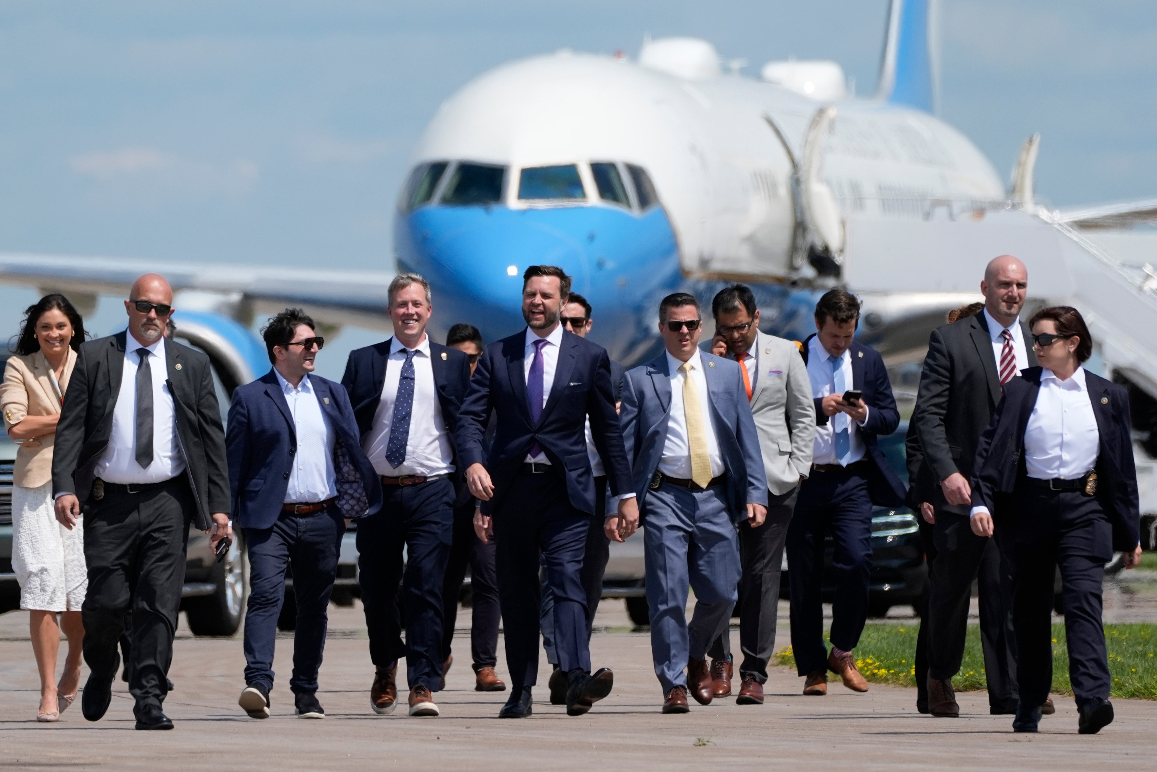 Republican vice presidential nominee Sen. JD Vance, R-Ohio, walks back from looking at Air Force Two at Chippewa Valley Regional Airport, Wednesday, Aug. 7, 2024, in Eau Claire, Wis.