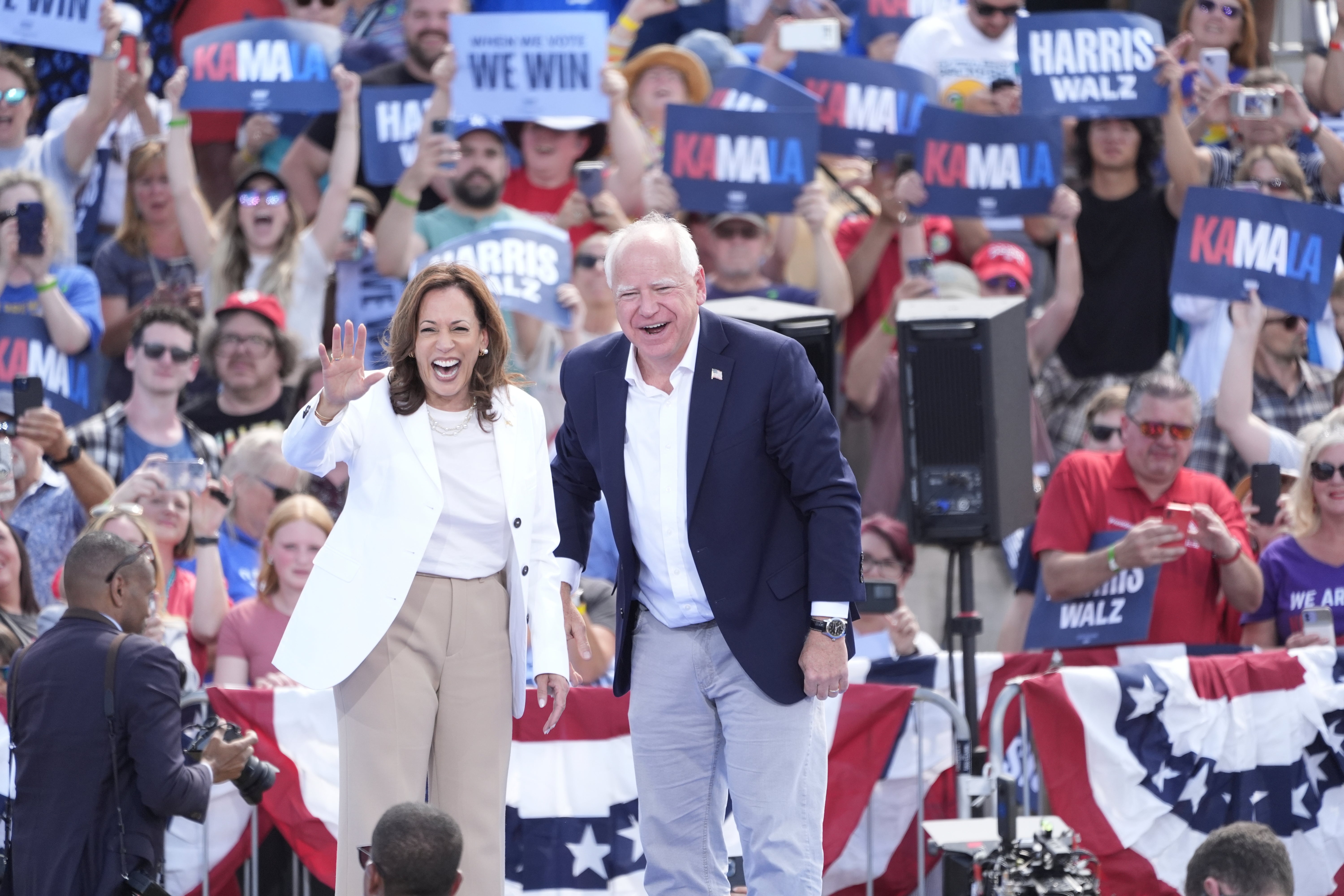 Kamala Harris and Tim Walz at their first rally together on Tuesday evening