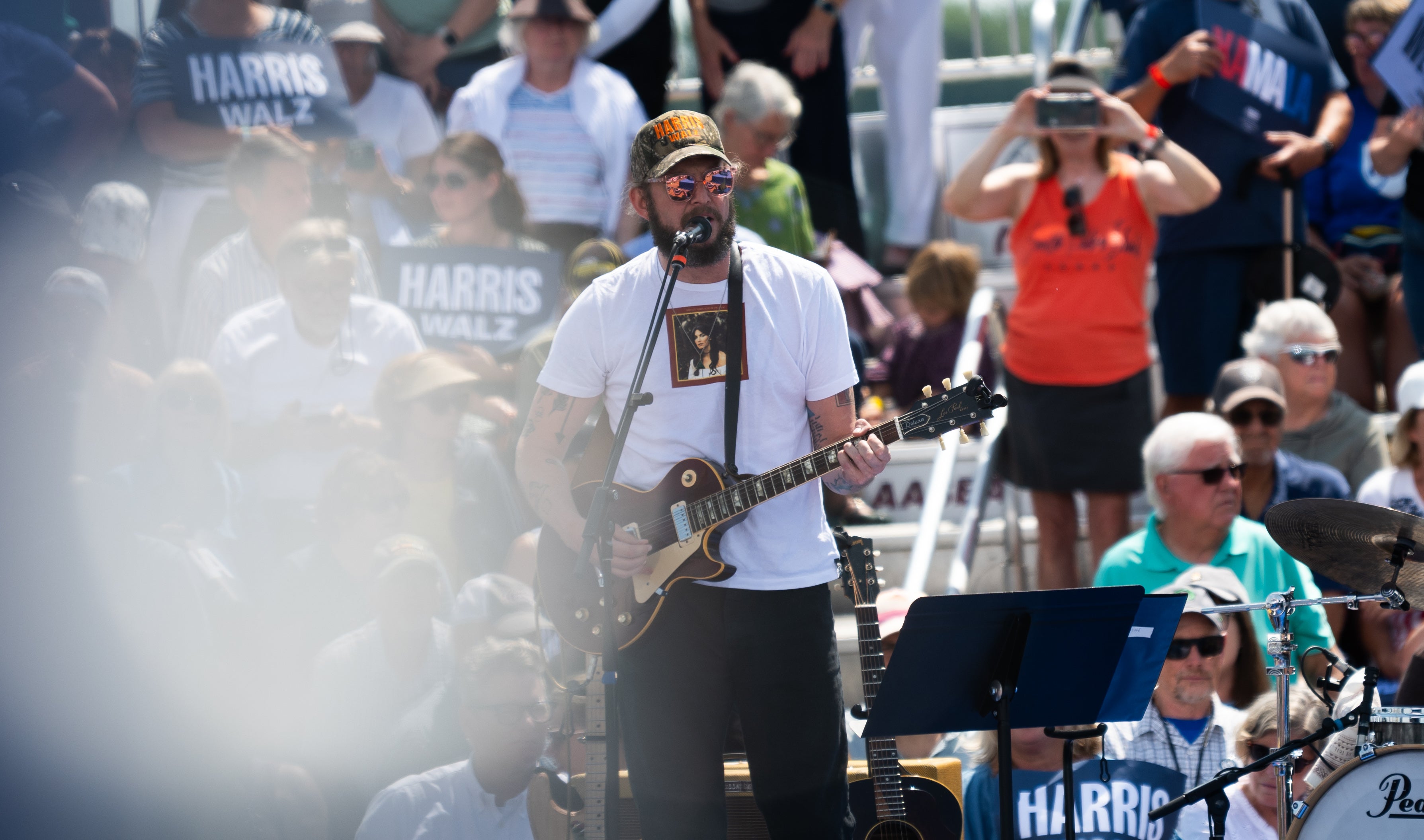 Bon Iver wears Harris-Walz camo hat on stage at rally in Wisconsin