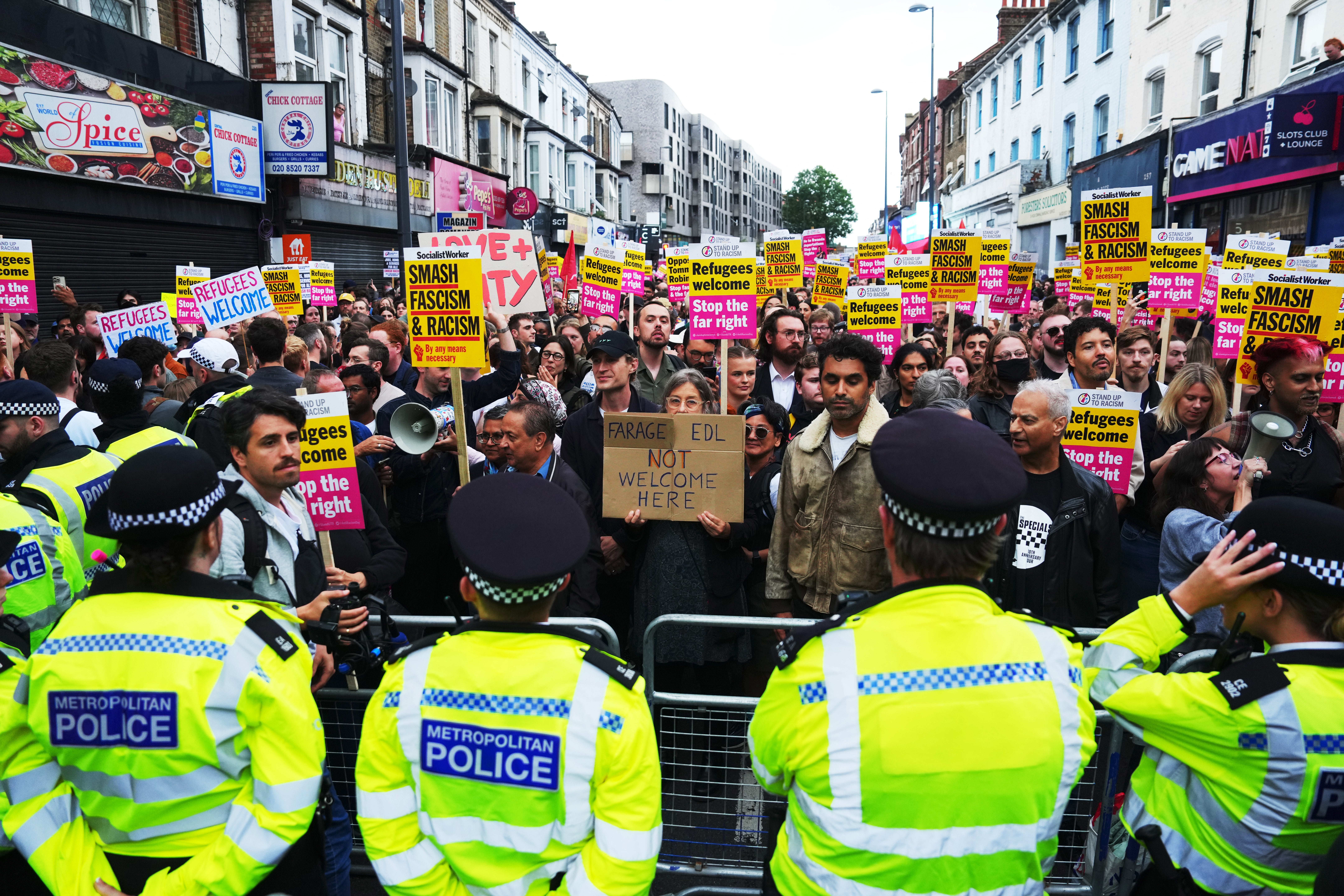 Protesters held placards reading ‘Refugees welcome’ and ‘Stop the far right’