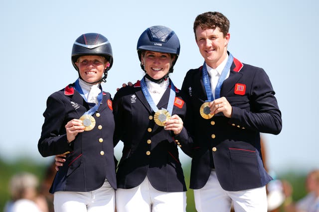Tom McEwen won team gold at Paris Olympics with Ros Canter (left) and Laura Collett (David Davies/PA)