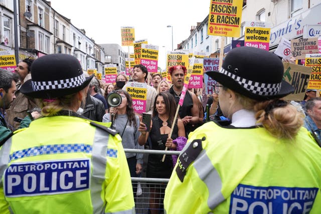 Demonstrators gathered in Walthamstow on Wednesday (PA)