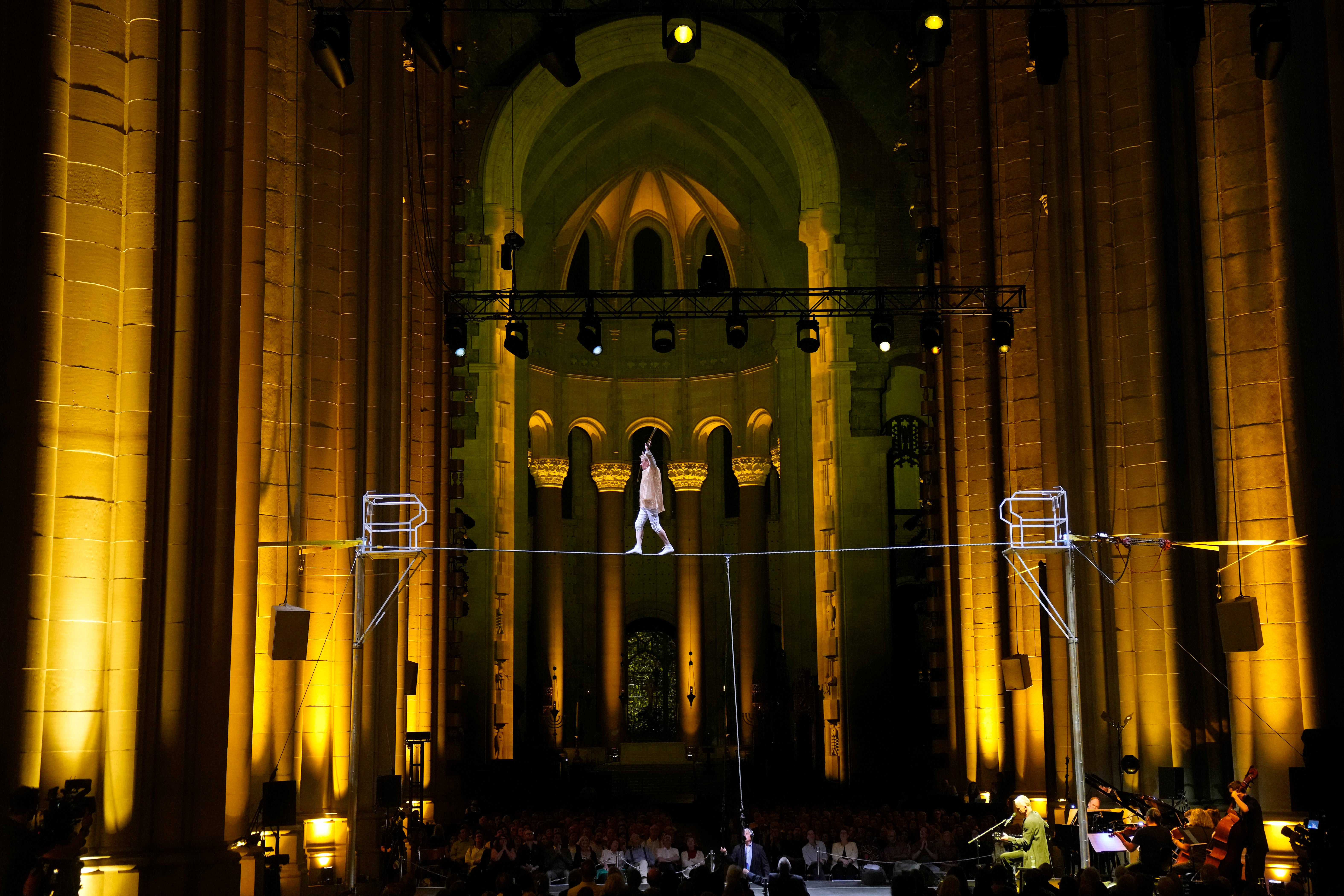 APTOPIX NY Philippe Petit "Towering" High-Wire Performance and Concert
