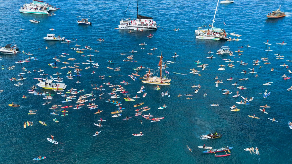 Maui remembers the 102 lost in the Lahaina wildfire with a paddle out 1 year after devastating blaze