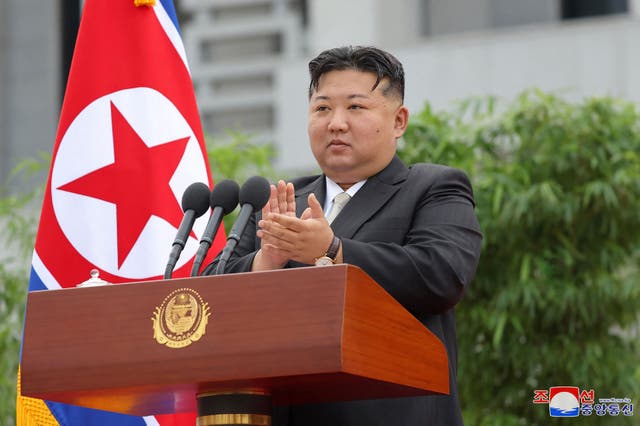 <p> North Korea's leader Kim Jong-n seeing off personnel being sent for the restoration and reconstruction after flood damage hit North Pyongan Province in late July</p>