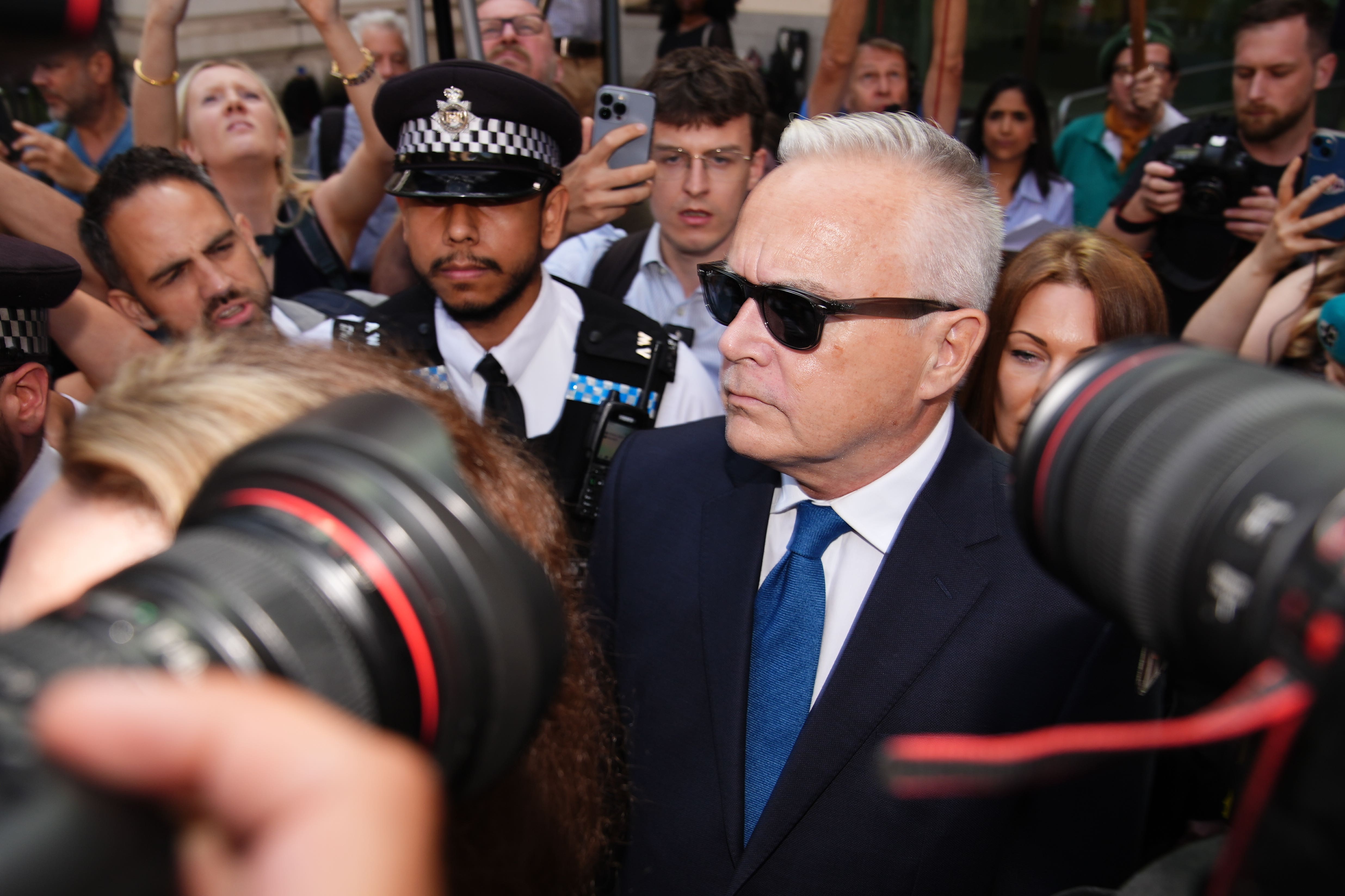 Former BBC broadcaster Huw Edwards leaves Westminster Magistrates’ Court where he pleaded guilty to three counts of making indecent images of children (Aaron Chown/PA)